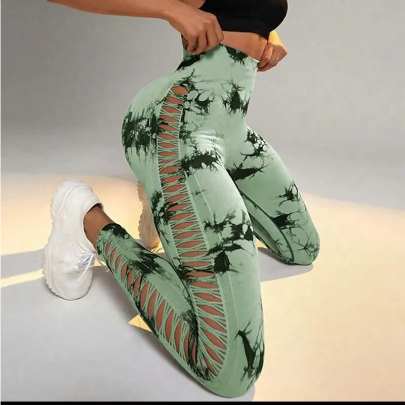 Pantalones de yoga ajustados con estampado tie-dye hueco para mujer