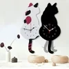 Reloj de pared con gato nórdico con cola meneando