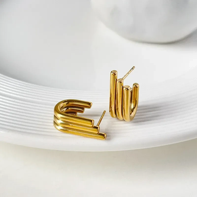 Pendientes de acero inoxidable con forma de ala pequeña para mujer