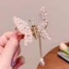 Pinza para el pelo con forma de mariposa bailarina