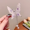 Pinza para el pelo con forma de mariposa bailarina