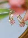 Pendientes de perlas con flores de cuatro hojas y cristales de moda