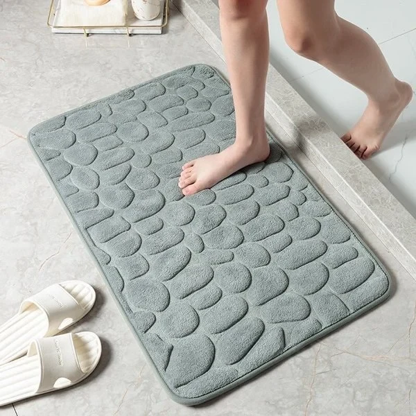 Alfombra de baño con relieve de adoquines