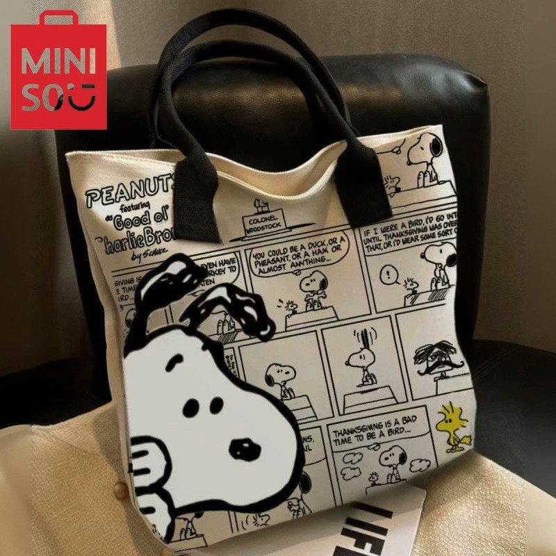 MINISO - Bolso de lona con estampado de Snoopy, gran capacidad, informal, versátil, para compras y para el hombro