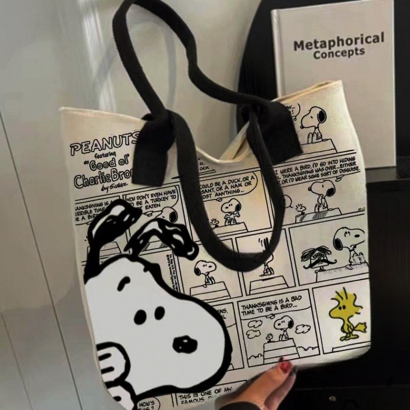 MINISO - Bolso de lona con estampado de Snoopy, gran capacidad, informal, versátil, para compras y para el hombro