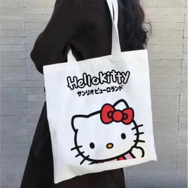 MINISO Disney - Bolso de lona para mujer, diseño de Hello Kitty, ideal para ir de compras, de viaje y de diseño de lujo
