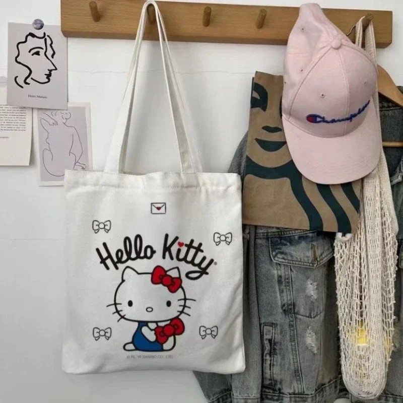 MINISO Disney - Bolso de lona para mujer, diseño de Hello Kitty, ideal para ir de compras, de viaje y de diseño de lujo