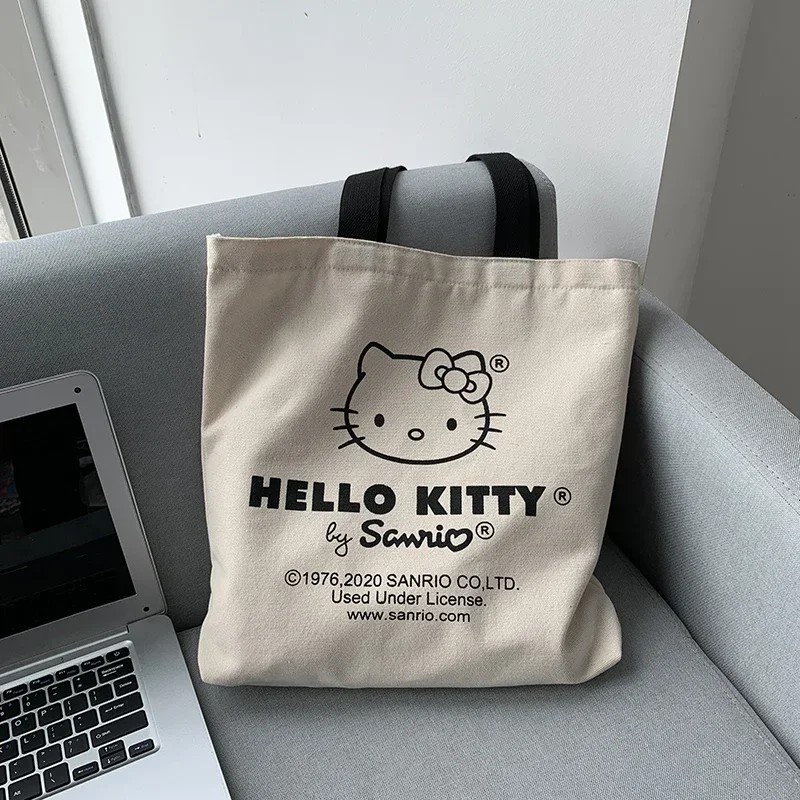 MINISO Disney - Bolso de lona para mujer, diseño de Hello Kitty, ideal para ir de compras, de viaje y de diseño de lujo