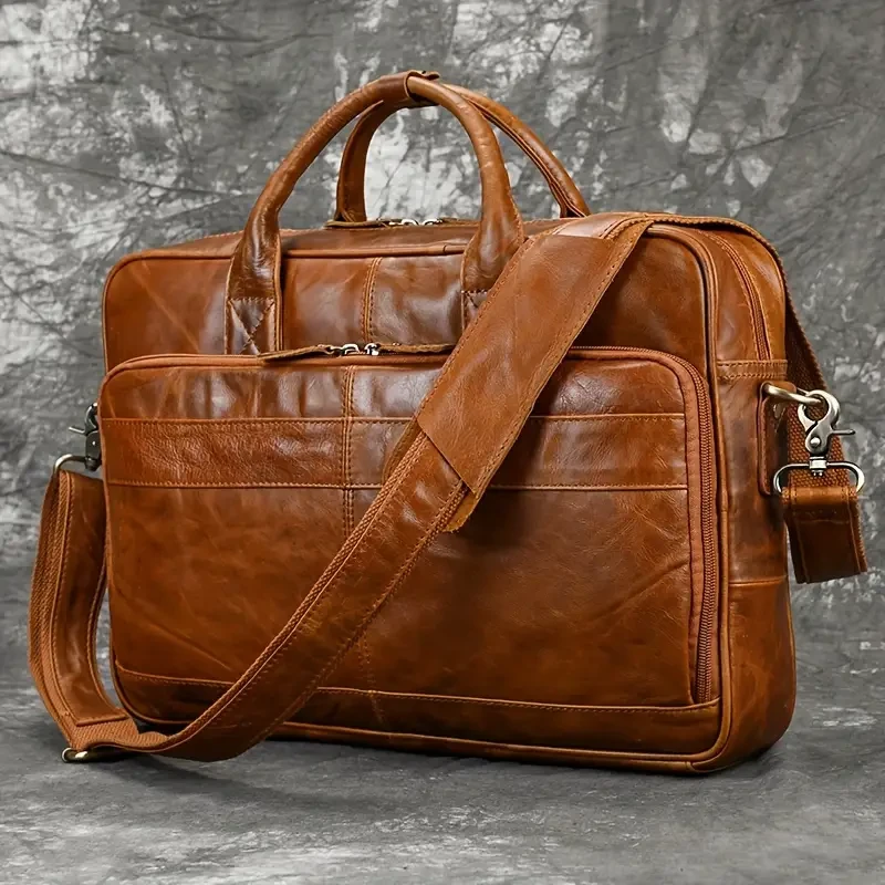 Maletín de piel auténtica de primera calidad: elegante bolso para portátil para profesionales de negocios: duradero, espacioso y con cómoda correa para el hombro.