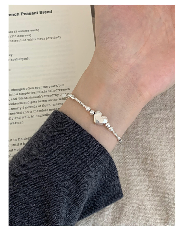 Pulsera de plata de ley con forma de corazón y pequeñas piezas de plata para mujer