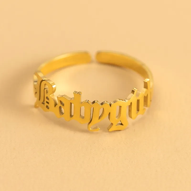 Anillo ajustable de acero inoxidable dorado "Babygirl" para mujer