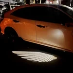 Luz de bienvenida de alas de ángel