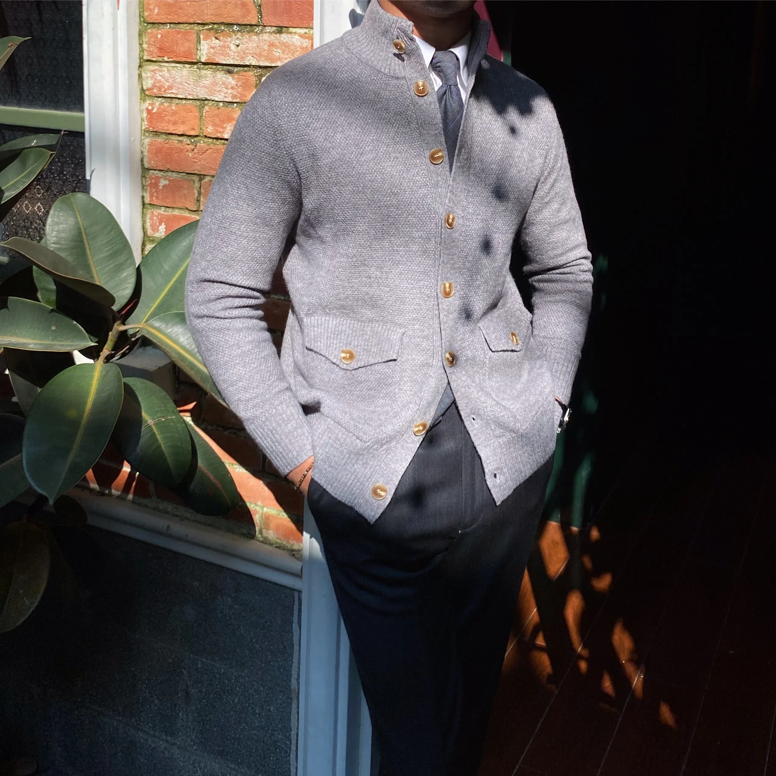 Chaqueta de punto cálida de botonadura sencilla