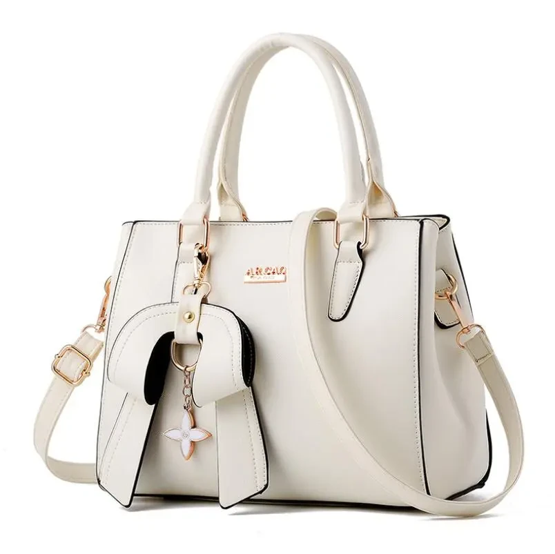 Bolso bandolera de moda para mujer, portátil y dulce.