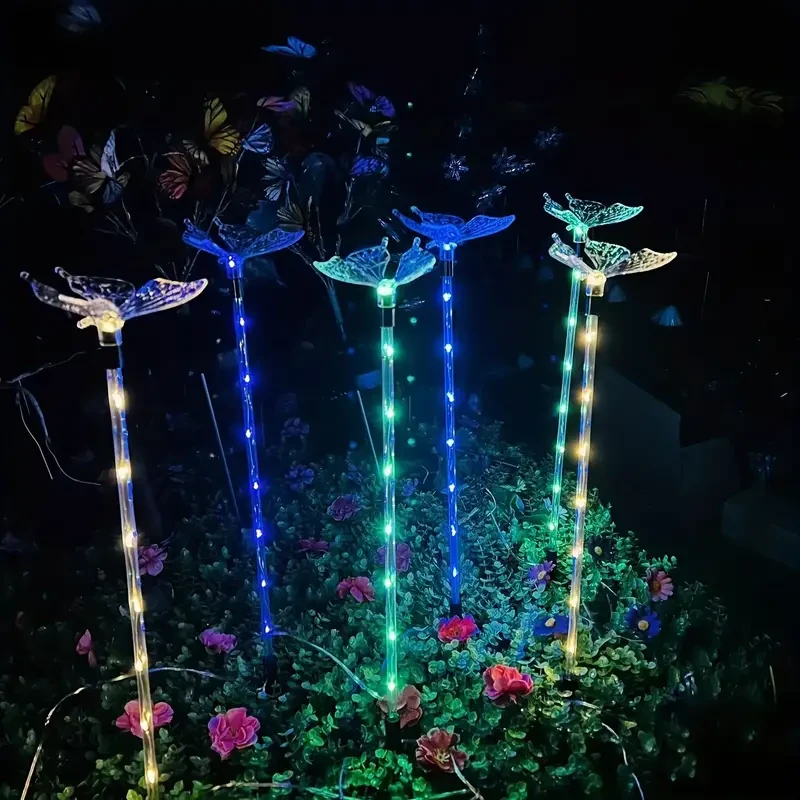 Juego de 4 luces solares de mariposa para jardín: decoración exterior para terraza, parterres y hogar.