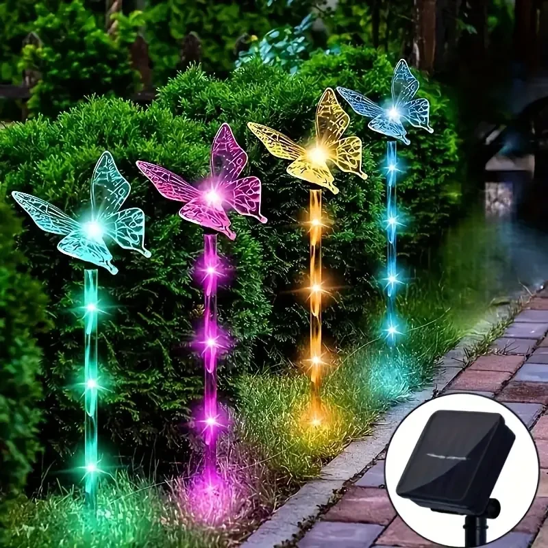 Juego de 4 luces solares de mariposa para jardín: decoración exterior para terraza, parterres y hogar.