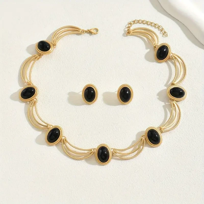 Conjunto de collar y pendientes ovalados negros de estilo vintage