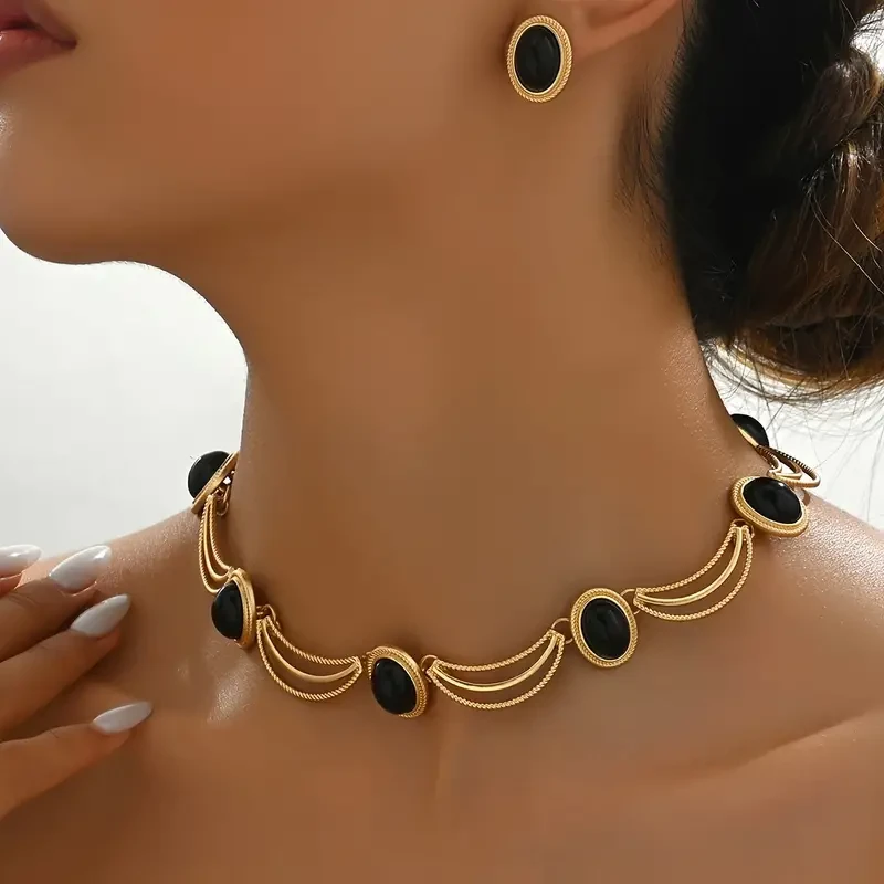 Conjunto de collar y pendientes ovalados negros de estilo vintage