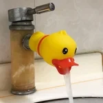 Extensor de grifo con dibujos de peces para niños