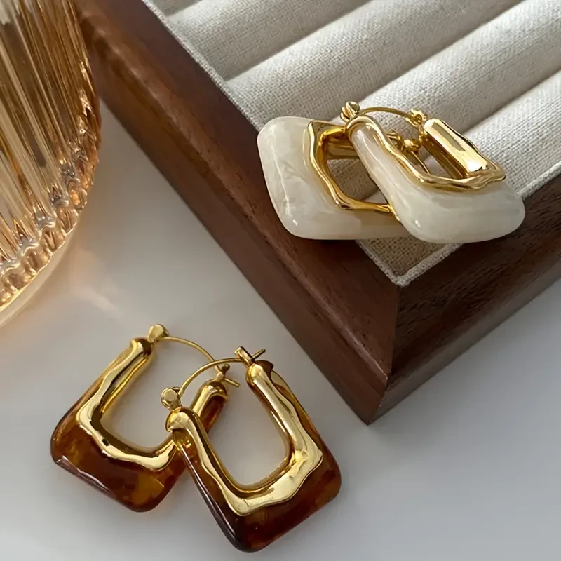 1 par de elegantes pendientes de aro en forma de U