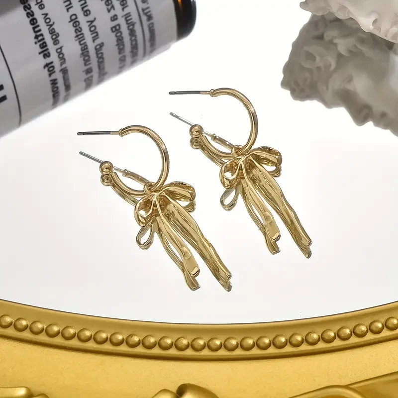 1 par de pendientes colgantes,