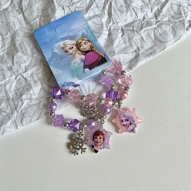 Pulsera con dijes de la Princesa Anna y la Reina Elsa de Frozen