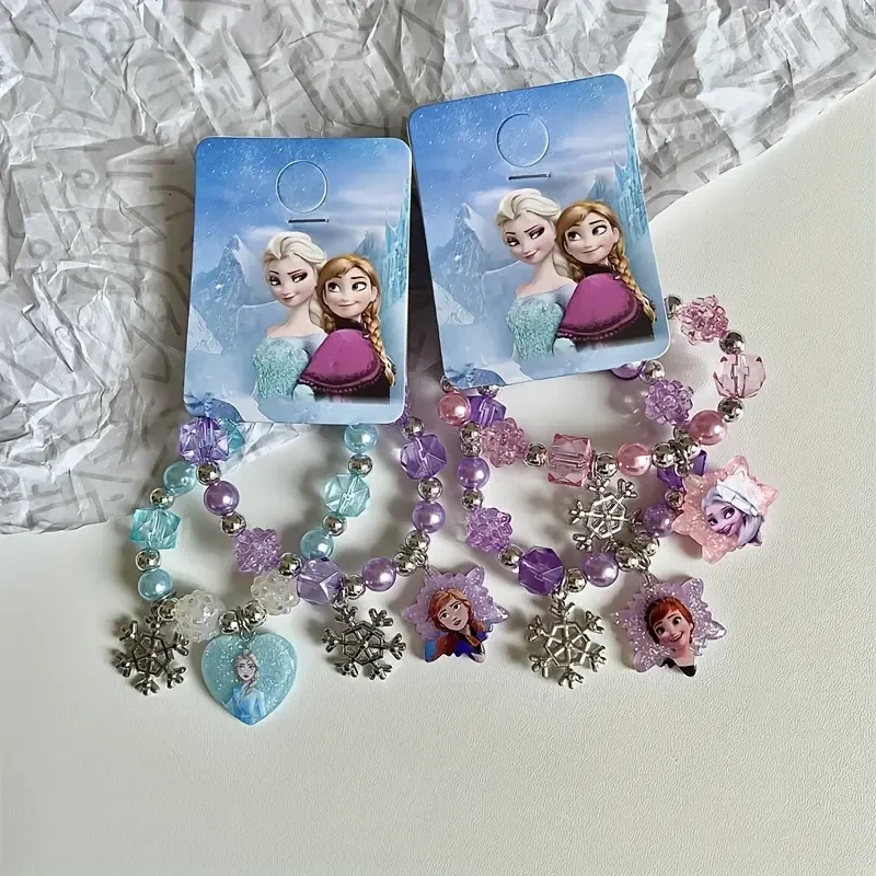 Pulsera con dijes de la Princesa Anna y la Reina Elsa de Frozen