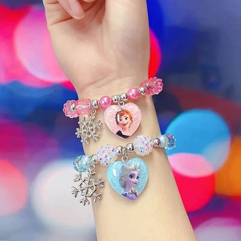 Pulsera con dijes de la Princesa Anna y la Reina Elsa de Frozen