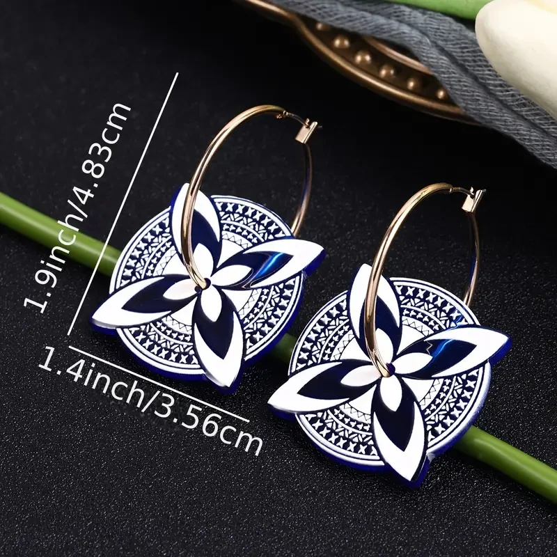Pendientes de mariposa de acrílico azul y blanco