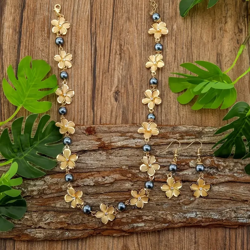 Elegante conjunto de joyas de concha y perla de plumeria hawaiana