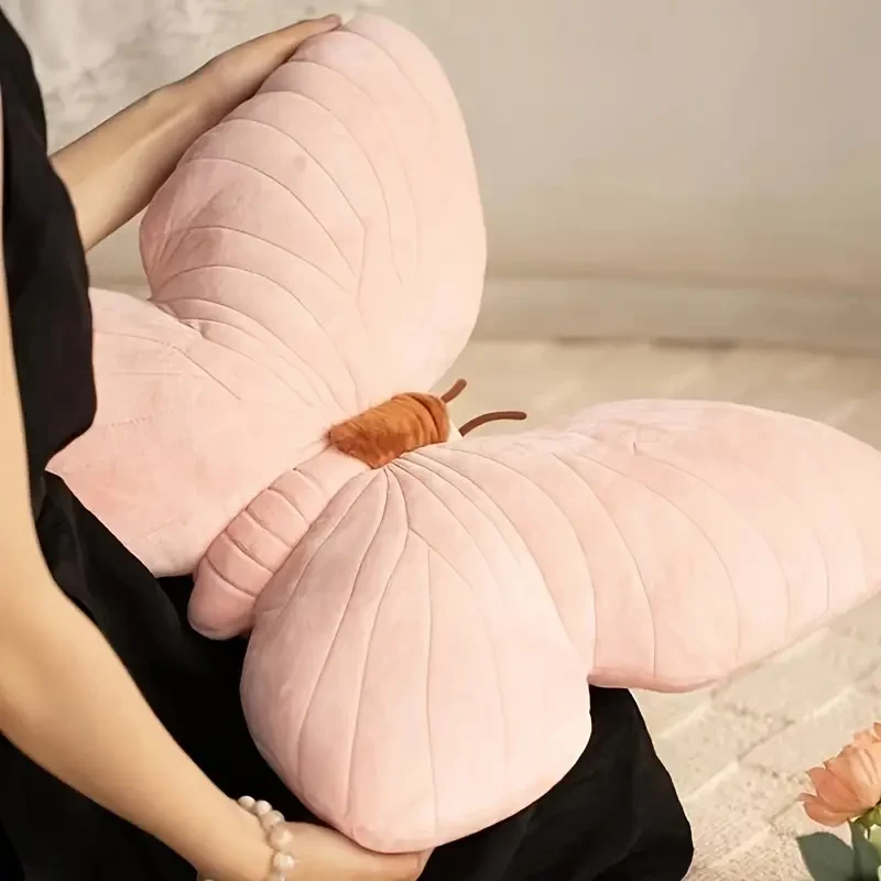 Almohada de mariposa rosa suave