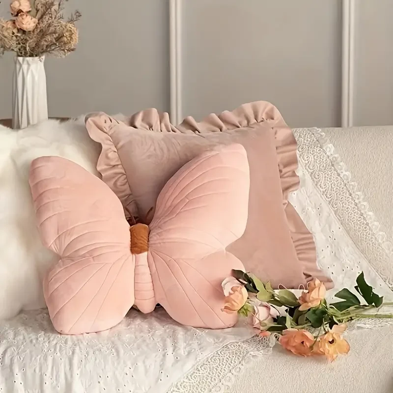 Almohada de mariposa rosa suave