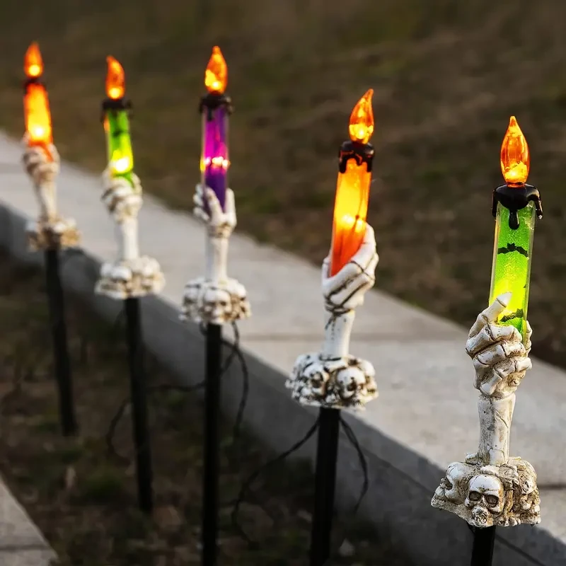 Vela iluminada con esqueleto (una estaca solar y cinco luces), adornos de resina con esqueleto de fácil instalación.