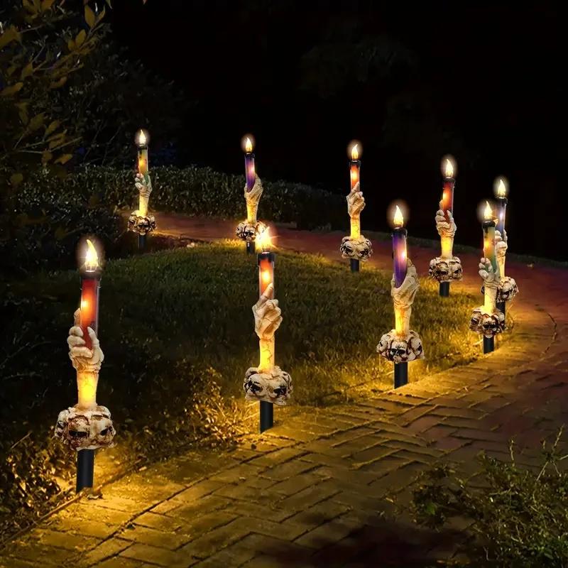 Vela iluminada con esqueleto (una estaca solar y cinco luces), adornos de resina con esqueleto de fácil instalación.
