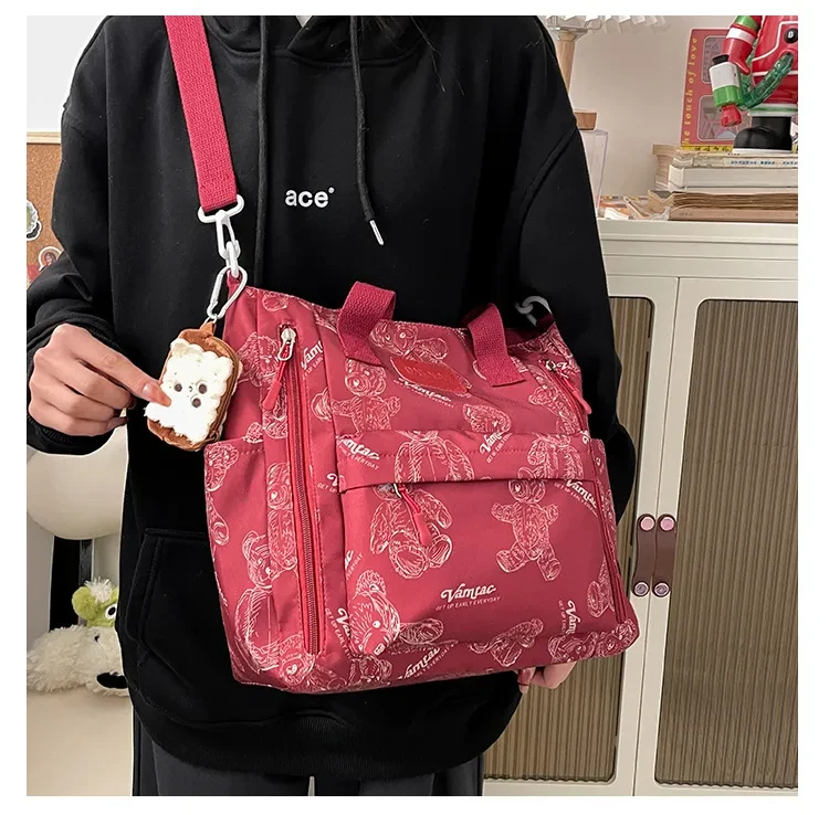 Bolso de mano multibolsillos tipo bandolera