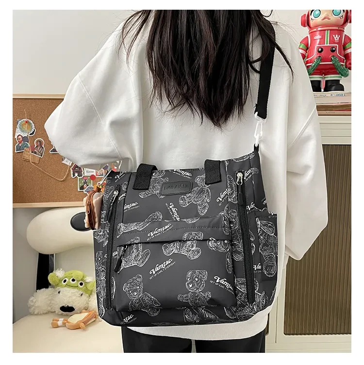 Bolso de mano multibolsillos tipo bandolera