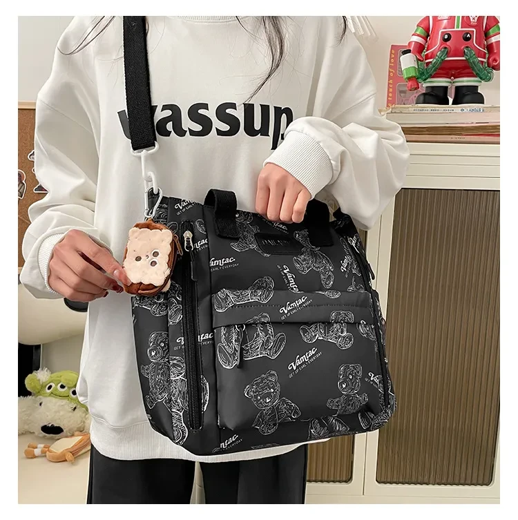 Bolso de mano multibolsillos tipo bandolera