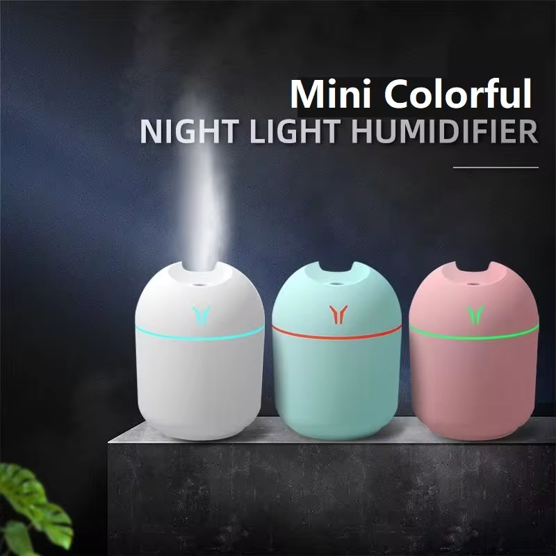 Mini humidificador de aire, difusor de aceites esenciales para el hogar y el coche, ultrasónico, silencioso, con lámpara LED de color.
