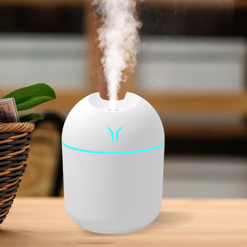Mini humidificador de aire, difusor de aceites esenciales para el hogar y el coche, ultrasónico, silencioso, con lámpara LED de color.
