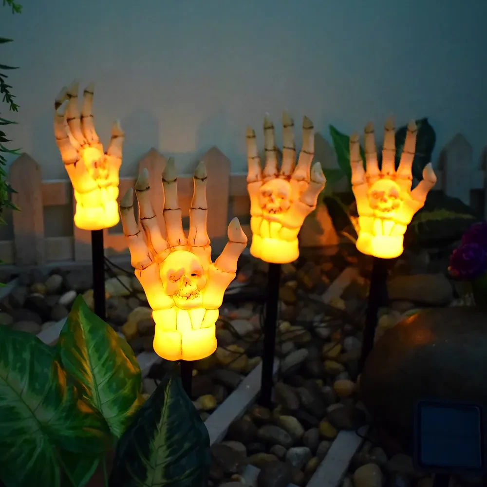 Luz solar impermeable para patio con forma de mano fantasma