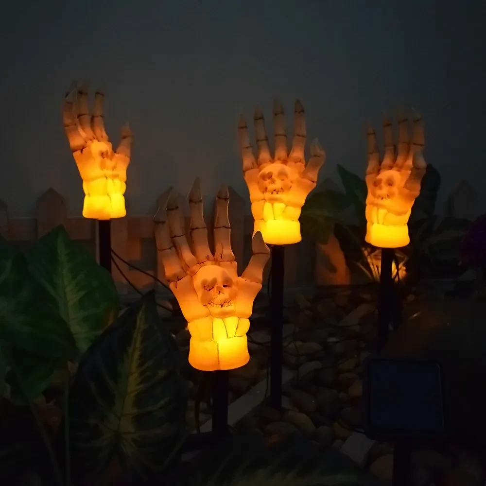 Luz solar impermeable para patio con forma de mano fantasma