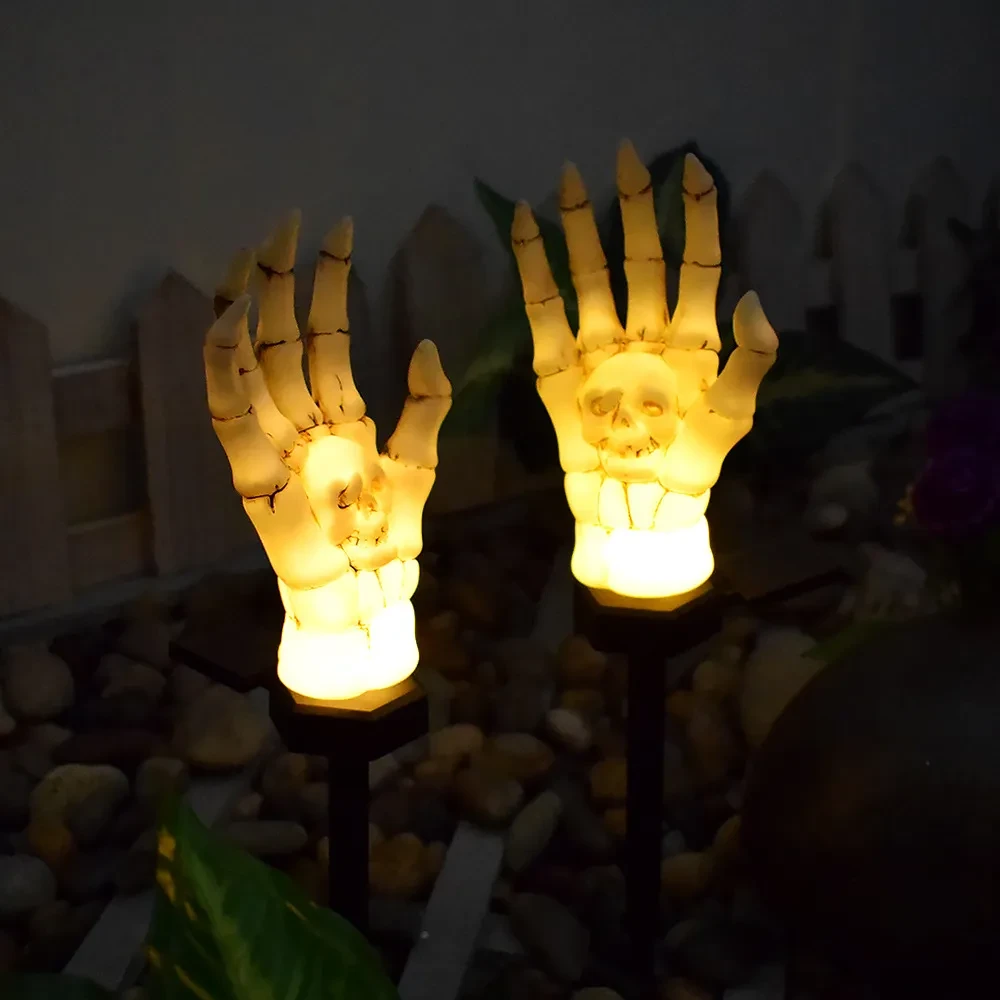 Luz solar impermeable para patio con forma de mano fantasma
