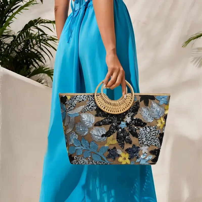 Bolsa de paja con asas de bambú