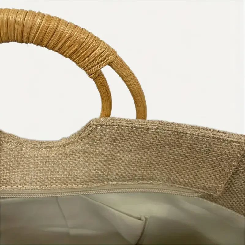 Bolsa de paja con asas de bambú