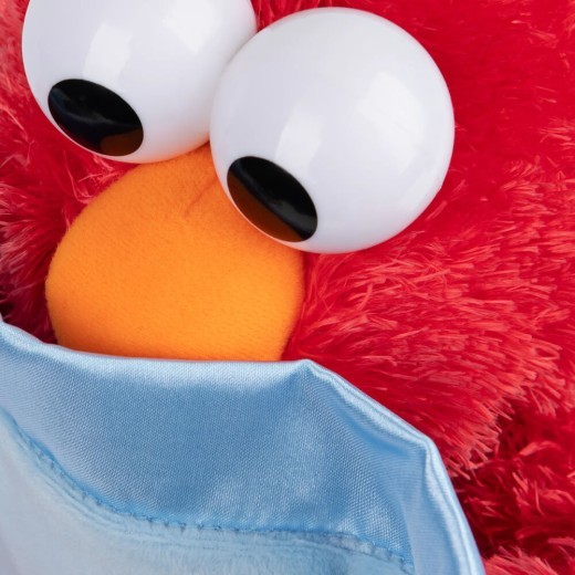 Peluche animado de Elmo con la figura del cucú de Barrio Sésamo