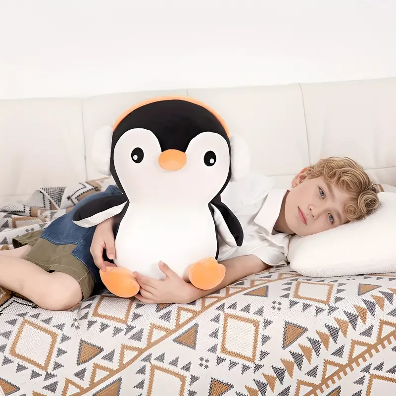 Adorable pingüino de peluche de 40,64 cm con auriculares: suave y tierno juguete de almohada corporal para niños.
