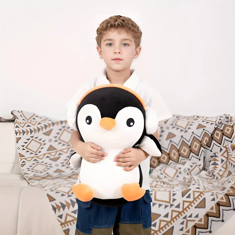 Adorable pingüino de peluche de 40,64 cm con auriculares: suave y tierno juguete de almohada corporal para niños.