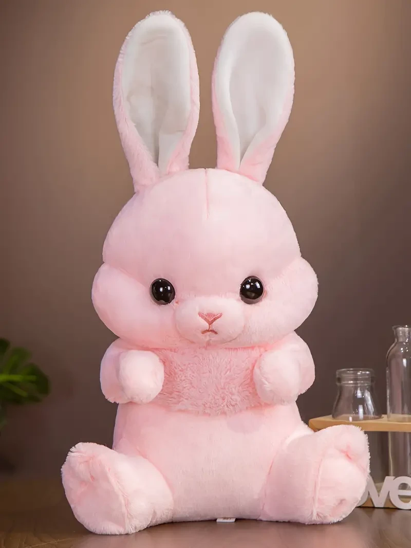 Adorable conejo de orejas largas de peluche