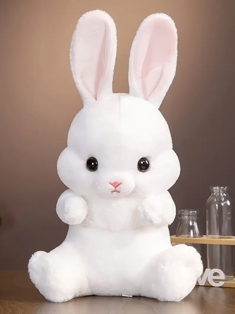 Adorable conejo de orejas largas de peluche