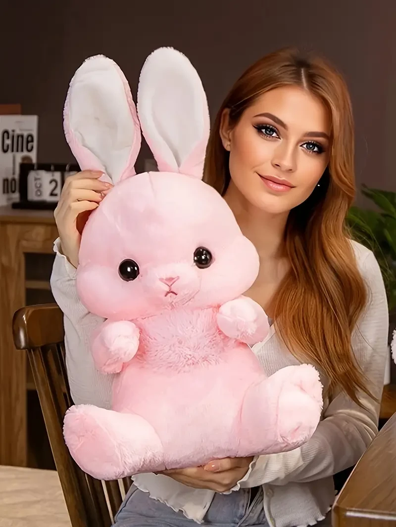 Adorable conejo de orejas largas de peluche